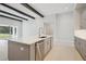 Kitchen island with white quartz countertop and stainless steel dishwasher at 12823 Daleridge Pl, Riverview, FL 33579