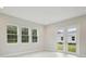 Bright room with French doors and access to backyard at 12823 Daleridge Pl, Riverview, FL 33579