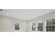 Well-lit room with multiple windows and neutral walls at 12823 Daleridge Pl, Riverview, FL 33579