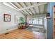 Relaxing living room with hardwood floors, vaulted ceiling and fireplace at 5101 W Platt St, Tampa, FL 33609