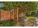 Lovely pergola covered in greenery creates a shaded seating area at 5101 W Platt St, Tampa, FL 33609