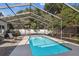 Refreshing screened pool with plenty of surrounding deck space at 5101 W Platt St, Tampa, FL 33609