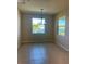 Bright dining room with water view and chandelier at 1027 Ocean Spray Dr, Ruskin, FL 33570