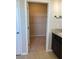Large walk-in closet with built-in shelving at 1027 Ocean Spray Dr, Ruskin, FL 33570