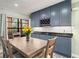 Dining area with new cabinets, granite counters, and a wine rack at 104 Cypress Pond Rd, Palm Harbor, FL 34683