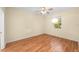 Well-lit bedroom featuring light wood laminate flooring at 715 Grand Canyon Dr, Valrico, FL 33594