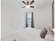 Bright bedroom with double door closet and ceiling fan at 11633 Mandevilla View Way, Riverview, FL 33579