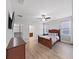 Main bedroom with hardwood floors and ceiling fan at 11633 Mandevilla View Way, Riverview, FL 33579