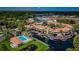 Aerial view of waterfront community with pool and boat docks at 2571 Cyprus Dr # 1-202, Palm Harbor, FL 34684