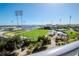 Elevated view shows a green sports field, stadium seating, and the waterfront stadium in the background at 301 1St S St # 1104, St Petersburg, FL 33701