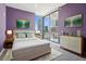 Cozy bedroom with modern decor, bright windows, and city view at 301 1St S St # 1104, St Petersburg, FL 33701