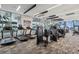 The modern fitness center has treadmills, weights, machines and ocean views at 301 1St S St # 1104, St Petersburg, FL 33701