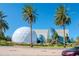 Unique architectural design of The Dali Museum featuring geometric shapes and lush landscaping on a sunny day at 301 1St S St # 1104, St Petersburg, FL 33701