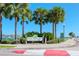 Beautiful entrance sign to Albert Whitted Park with palm trees in background at 301 1St S St # 1104, St Petersburg, FL 33701