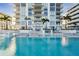 Beautiful in-ground pool with lounge seating and direct access to the units in this building at 301 1St S St # 1104, St Petersburg, FL 33701