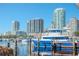 Scenic waterfront view with marina, boats, and modern high-rise buildings at 301 1St S St # 1104, St Petersburg, FL 33701