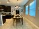 Kitchen dining area with a table and four chairs at 2117 Valterra Vista Way, Valrico, FL 33594