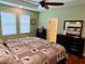 Main bedroom with a king-size bed and two dressers at 2117 Valterra Vista Way, Valrico, FL 33594