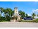 Grand entrance to MiraBay community with lush landscaping at 618 Islebay Dr, Apollo Beach, FL 33572