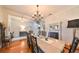 Bright dining room with hardwood floors and a chandelier at 618 Islebay Dr, Apollo Beach, FL 33572