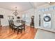 Elegant dining room featuring hardwood floors and a chandelier at 618 Islebay Dr, Apollo Beach, FL 33572