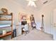 Bright and airy home office, featuring a workspace and built-in shelving at 618 Islebay Dr, Apollo Beach, FL 33572