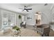 Spacious living room with gray armchairs and a ceiling fan at 6338 8Th S Ave, Gulfport, FL 33707