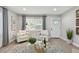 Light-filled living room featuring stylish seating and a modern coffee table at 6338 8Th S Ave, Gulfport, FL 33707