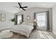 Spacious main bedroom with vaulted ceiling and large windows at 6338 8Th S Ave, Gulfport, FL 33707