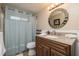 Clean bathroom with granite countertop and updated vanity at 1875 Stetson Dr, Clearwater, FL 33765