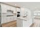 Modern kitchen featuring stainless appliances and an oversized kitchen island at 3584 Maple Bay Ln, Land O Lakes, FL 34638