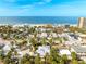 Aerial view of beach neighborhood, close to the ocean at 851 Mandalay Ave, Clearwater Beach, FL 33767