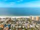 Aerial of beachfront homes and ocean at 851 Mandalay Ave, Clearwater Beach, FL 33767