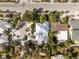 Aerial view of house and surrounding neighborhood at 851 Mandalay Ave, Clearwater Beach, FL 33767