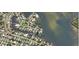 Aerial view showing home location in a waterfront community with parks nearby at 1943 Bayou Grande Ne Blvd, St Petersburg, FL 33703