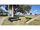 Relaxing picnic area with tables, trees, and waterfront views at 5227 Dayton Ln, Port Charlotte, FL 33981