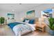 Spacious bedroom with a plush bed and calming decor at 1009 Farragut N Dr, St Petersburg, FL 33710