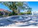 Community hot tub with surrounding brick and patio at 3505 Tarpon Woods Blvd # K409, Palm Harbor, FL 34685