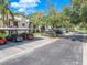 Community parking lot with covered spaces and convenient location at 3505 Tarpon Woods Blvd # K409, Palm Harbor, FL 34685