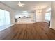 Open living space with wood-look floors and kitchen views at 17820 Monteverde Dr, Spring Hill, FL 34610