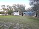 Several outbuildings in the backyard at 17820 Monteverde Dr, Spring Hill, FL 34610