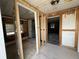 Unfinished bedroom with exposed framing and flooring at 519 79Th Ave, St Pete Beach, FL 33706