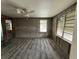 Unfinished living room with exposed walls and flooring at 519 79Th Ave, St Pete Beach, FL 33706