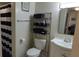 Clean bathroom with shower stall, toilet and vanity at 4154 Heron Way # 203B, Bradenton, FL 34205