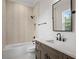 Modern bathroom with a walk-in shower and floating vanity at 4835 W San Jose St, Tampa, FL 33629