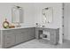 Stylish bathroom with gray vanity, quartz countertop, and gold accents at 4835 W San Jose St, Tampa, FL 33629