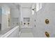 Spa-like bathroom with multi-head shower and marble finishes at 4835 W San Jose St, Tampa, FL 33629