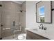 Stylish bathroom with a glass shower and updated vanity at 4835 W San Jose St, Tampa, FL 33629