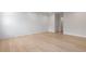 Light filled bedroom with hardwood floors and shiplap wall at 4835 W San Jose St, Tampa, FL 33629