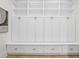 White built-in shelving and drawers with gold hardware; perfect for storage at 4835 W San Jose St, Tampa, FL 33629